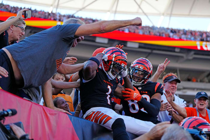 Cincinnati Bengals wide receiver Ja'Marr Chase (1) celebrates in the stands after a touchdown reception in the second quarter of the NFL Week 7 game between the Cincinnati Bengals and the Atlanta Falcons at Paycor Stadium in downtown Cincinnati on Sunday, Oct. 23, 2022. The Bengals led 28-17 at halftime. Mandatory Credit: Sam Greene-The Enquirer Atlanta Falcons At Cincinnati Bengals Nfl Week 7